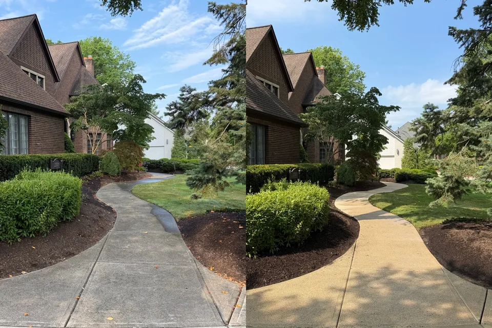 Before and after of a curving concrete front walk cleaned at a brick home in Westlake, Ohio, by Patty's Pressure Washing