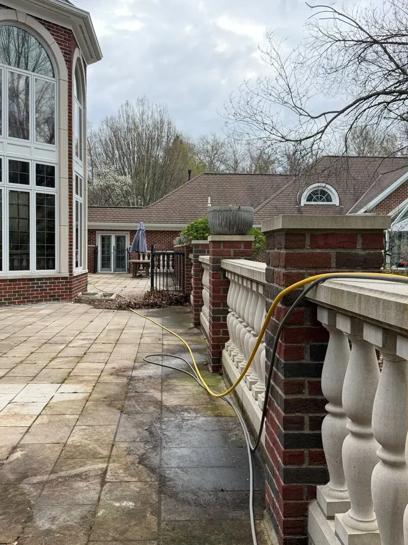 Brick and limestone balustrade in Westlake, Ohio, before cleaning