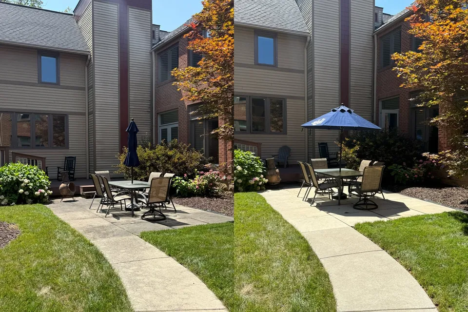 Before and after of a concrete patio and its curved walk cleaned at a commercial property in Cleveland, Ohio, by Patty's Pressure Washing