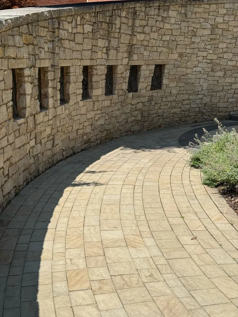 Limestone wall and walkway in Cleveland, Ohio, before cleaning