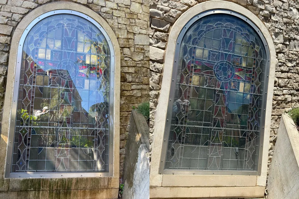 Before and after of a stained-glass window, its stone surround and sill cleaned at a commercial property in Cleveland, Ohio, by Patty's Pressure Washing