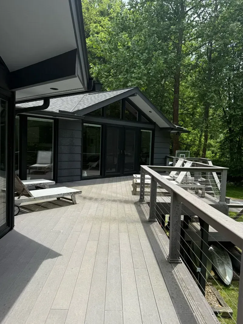 Composite deck and cable railing in Moreland Hills, Ohio, before cleaning