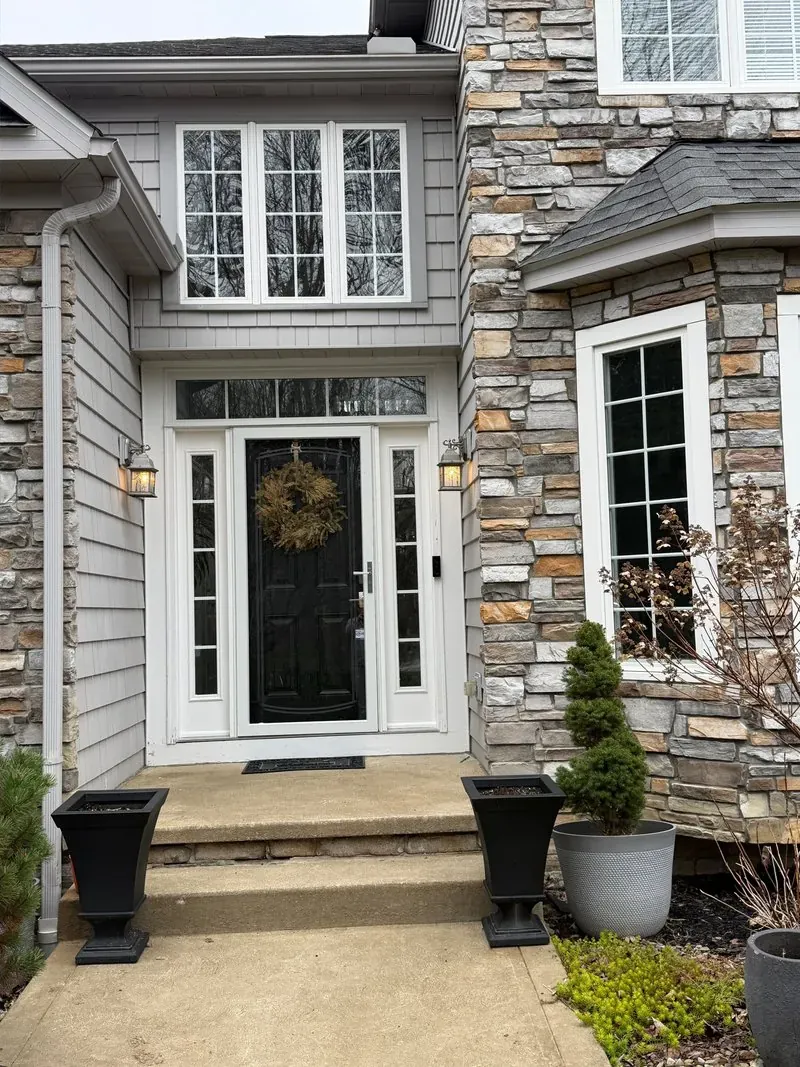 Stone and shake-sided entry in Chagrin Falls, Ohio, after cleaning by Patty's Pressure Washing