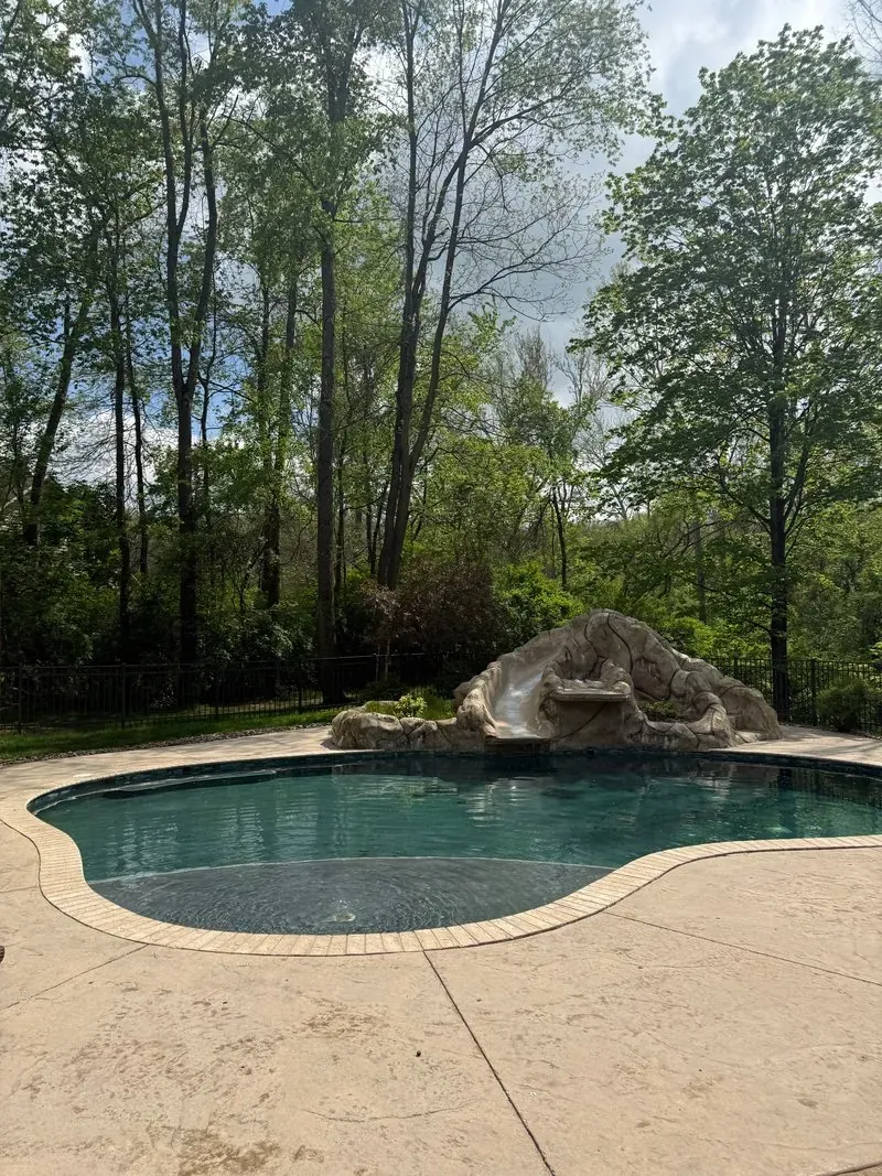 Stamped-concrete pool deck in Bentleyville, Ohio, after cleaning by Patty's Pressure Washing