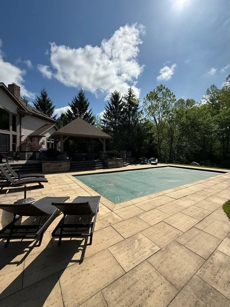 Paver pool deck and pavilion in Pepper Pike, Ohio, before cleaning