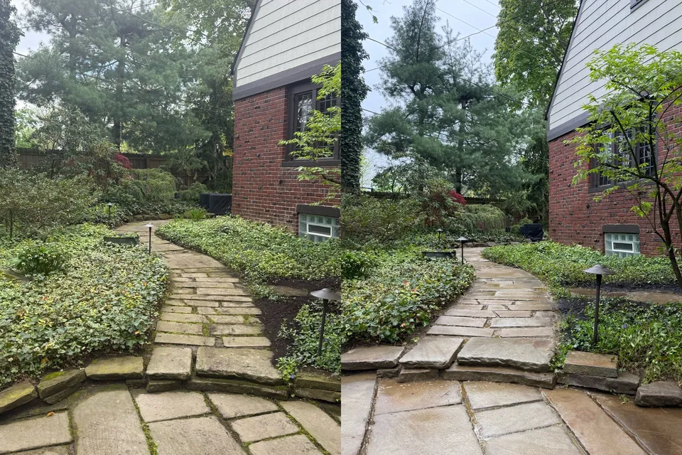 Before and after of a stone slab garden walk beside a brick house with a clapboard gable, cleaned in Shaker Heights, Ohio, by Patty's Pressure Washing