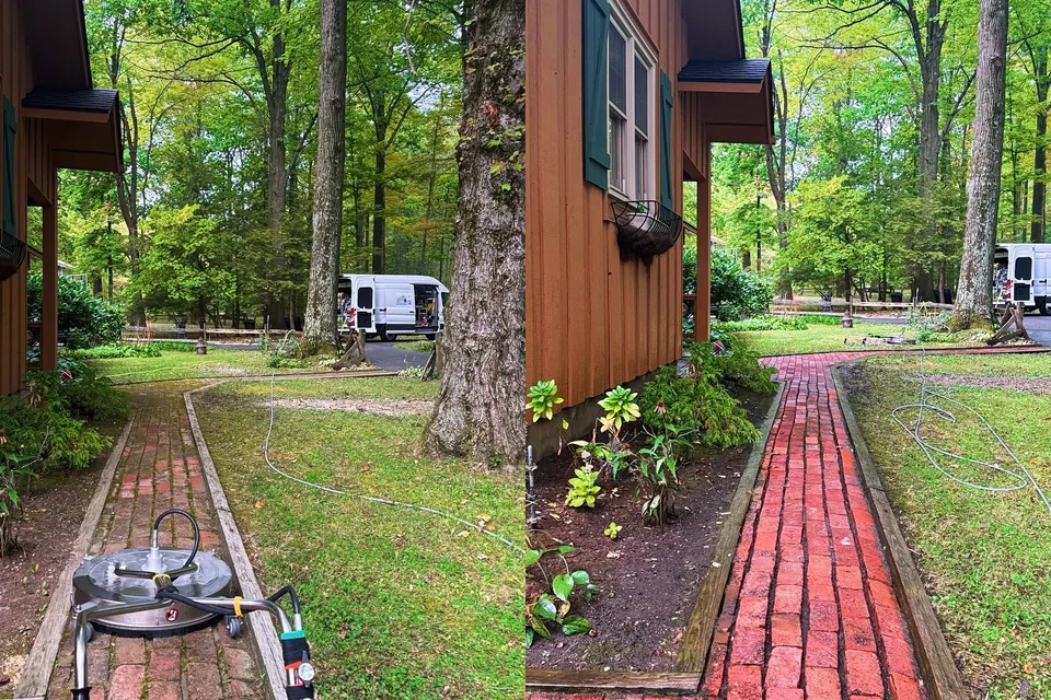 Before and after of a brick garden walk beside a board-and-batten house cleaned in Chagrin Falls, Ohio, by Patty's Pressure Washing