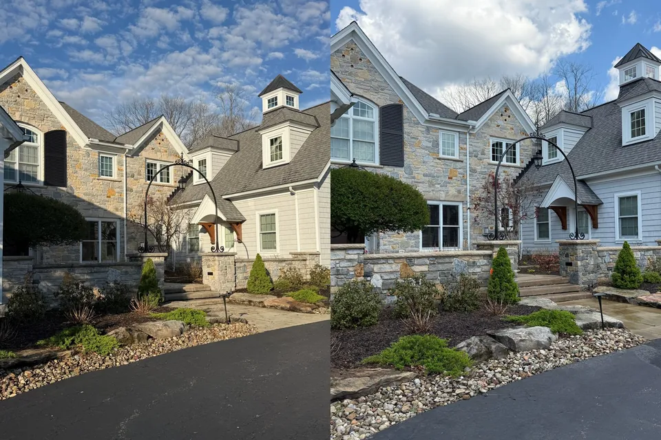 Before and after soft wash of a stone house, its stone garden wall and front steps in Bainbridge Township, Ohio, by Patty's Pressure Washing