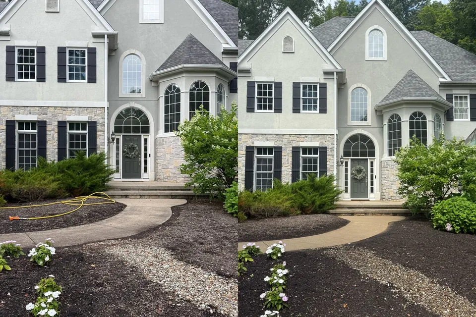 Before and after soft wash of a stone and stucco home's front entry and curved walkway in Chagrin Falls, Ohio, by Patty's Pressure Washing