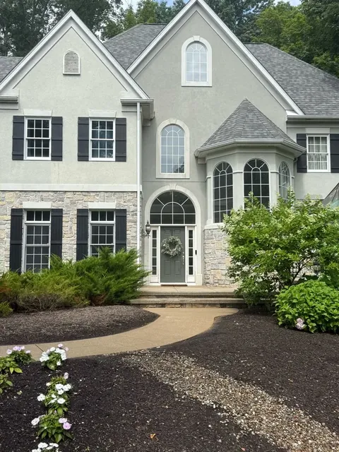 House wash and front walk in Chagrin Falls, Ohio, after cleaning by Patty's Pressure Washing
