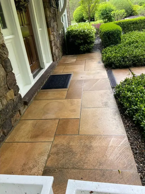 Sandstone front walkway in Gates Mills, Ohio, after cleaning by Patty's Pressure Washing