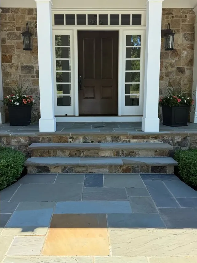 Stone front entry and bluestone walk in Hunting Valley, Ohio, after cleaning by Patty's Pressure Washing