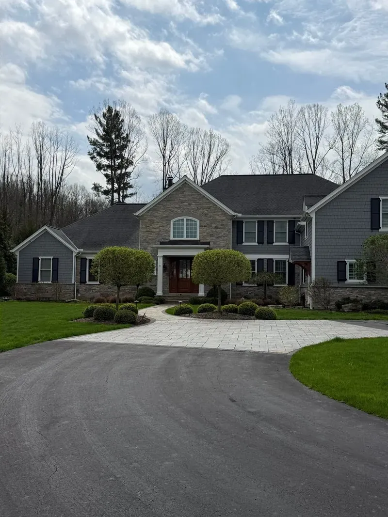 House wash and paver court in Moreland Hills, Ohio, after cleaning by Patty's Pressure Washing