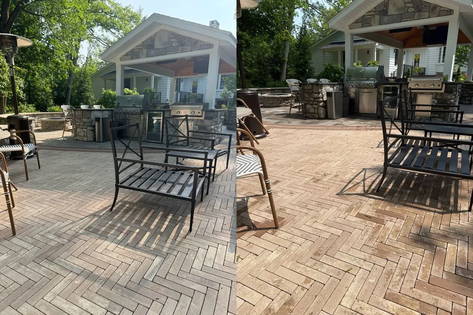 A herringbone paver terrace and covered stone outdoor kitchen at a Pepper Pike home, pressure washed by Patty's Pressure Washing