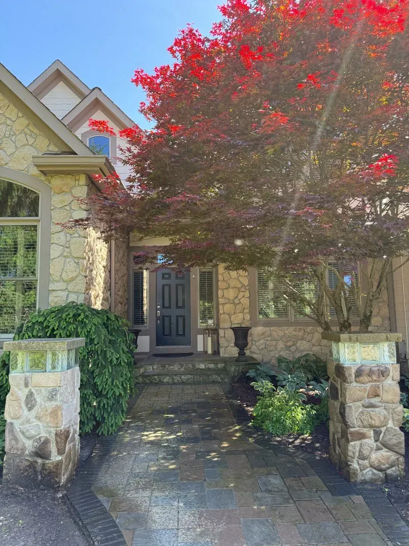 Stone entry and paver walk in Pepper Pike, Ohio, before cleaning