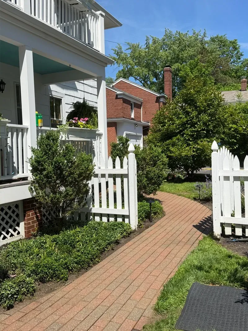 Brick walk and painted porch in Shaker Heights, Ohio, after cleaning by Patty's Pressure Washing