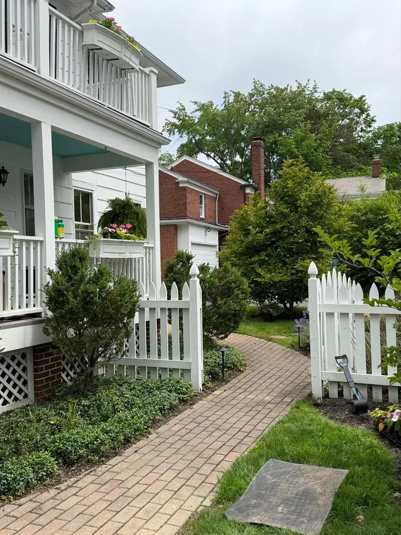 Brick walk and painted porch in Shaker Heights, Ohio, before cleaning