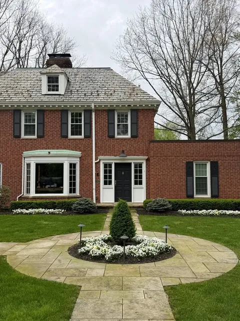 Brick colonial and flagstone forecourt in Shaker Heights, Ohio, before cleaning
