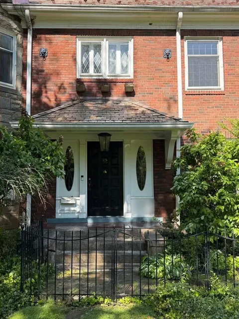 Brick entry porch and stone steps in Cleveland Heights, Ohio, after cleaning by Patty's Pressure Washing