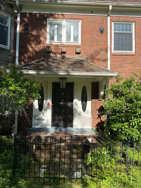 Brick entry porch and stone steps in Cleveland Heights, Ohio, before cleaning by Patty's Pressure Washing
